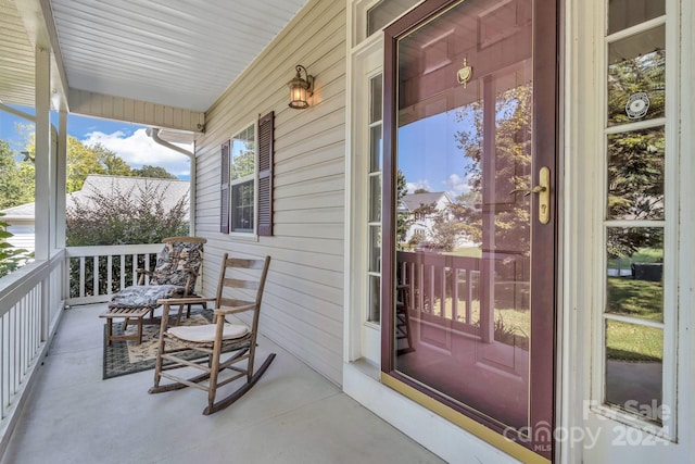 balcony featuring a porch