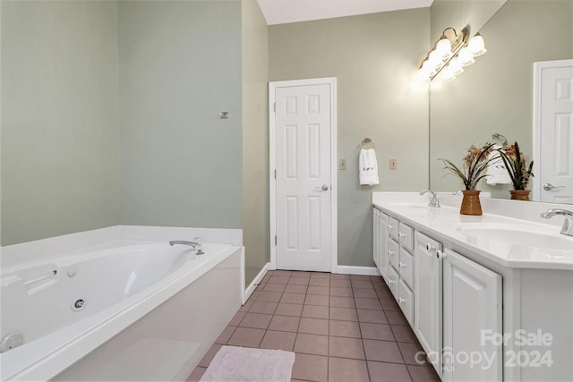 bathroom with vanity, tile patterned floors, and a tub