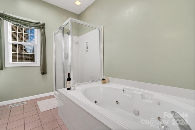 bathroom with plus walk in shower and tile patterned floors