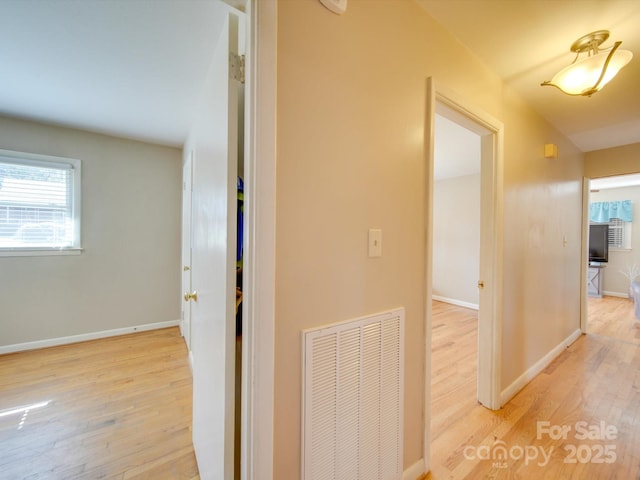 hall featuring light hardwood / wood-style flooring