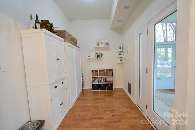 hallway featuring light hardwood / wood-style floors