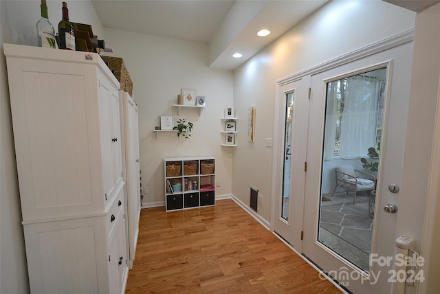 doorway to outside with light hardwood / wood-style flooring