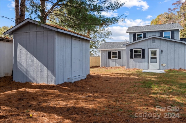 exterior space featuring a shed