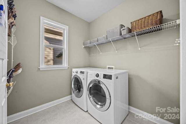 157 Montibello Dr, Mooresville, NC 28117 - laundry area with washing machine and dryer, baseboards, and light tile patterned flooring