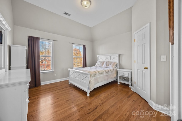 bedroom with wood-type flooring