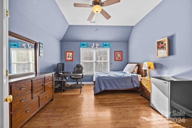 157 Montibello Dr, Mooresville, NC 28117 - bedroom with lofted ceiling, wood finished floors, a desk, and a ceiling fan