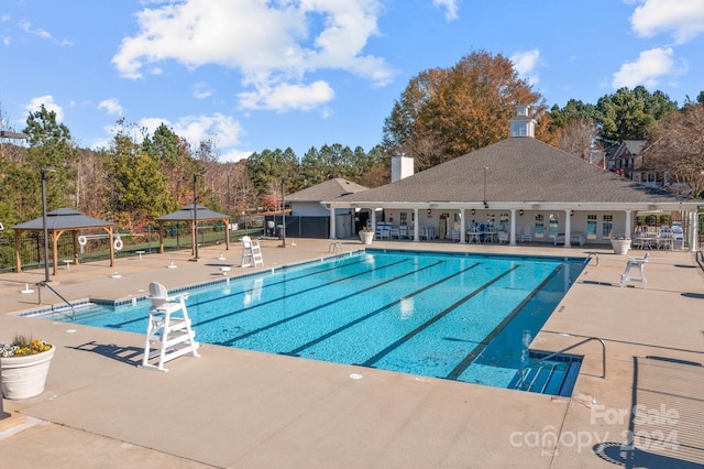 157 Montibello Dr, Mooresville, NC 28117 - community pool featuring a patio, french doors, and view of scattered trees