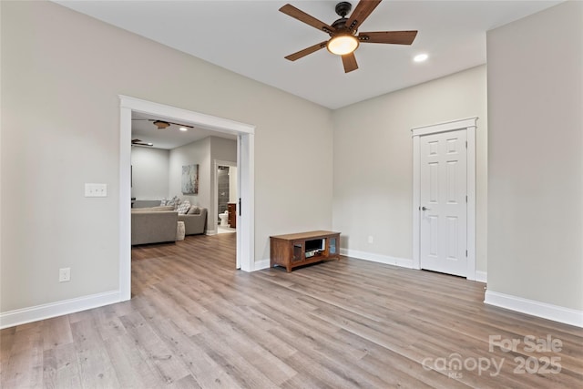 unfurnished room featuring light wood-style flooring, baseboards, ceiling fan, and recessed lighting