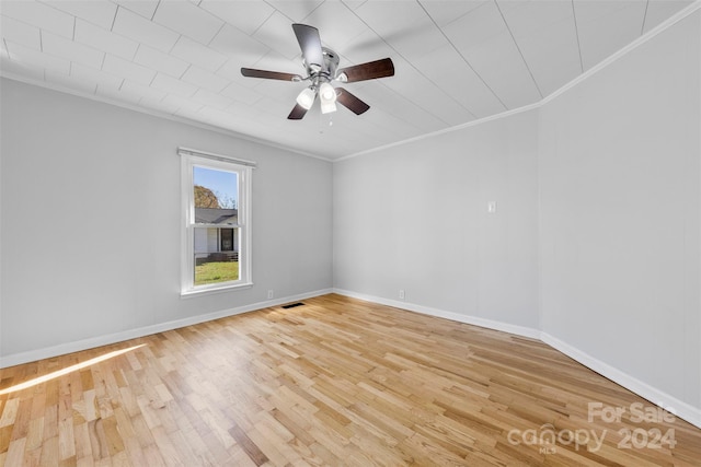 unfurnished room with ceiling fan, ornamental molding, and light hardwood / wood-style flooring