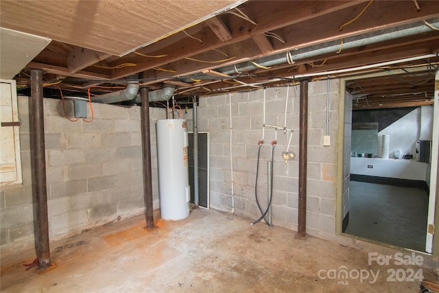 basement featuring water heater