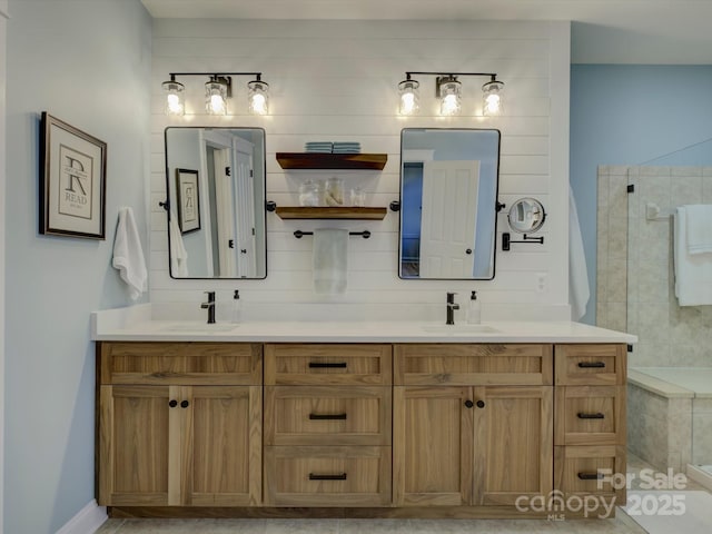 bathroom with vanity, backsplash, and walk in shower