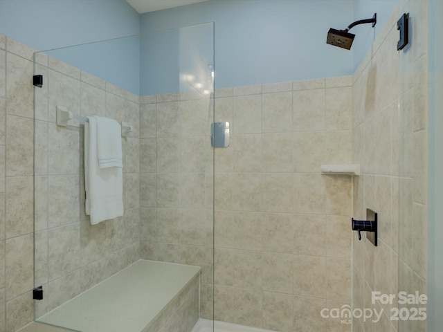 bathroom featuring an enclosed shower