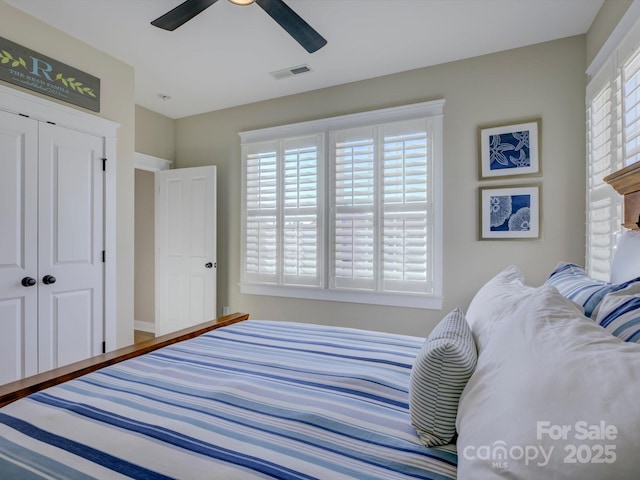 bedroom with a closet and ceiling fan