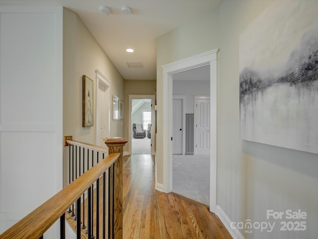 hallway featuring light hardwood / wood-style floors