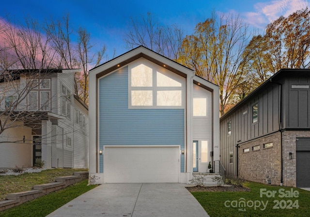 view of front of home with a garage