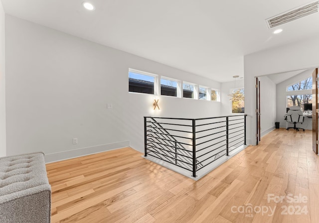 hall featuring hardwood / wood-style floors