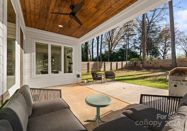 view of patio / terrace featuring ceiling fan