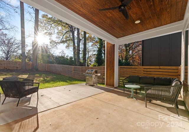 view of patio / terrace featuring outdoor lounge area, ceiling fan, and grilling area