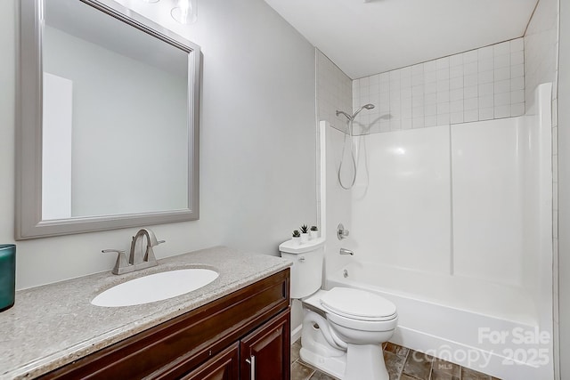 full bathroom with shower / tub combination, vanity, and toilet