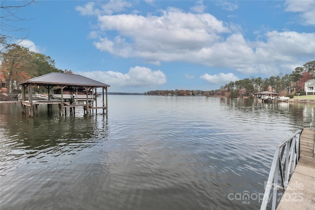 dock area with a water view