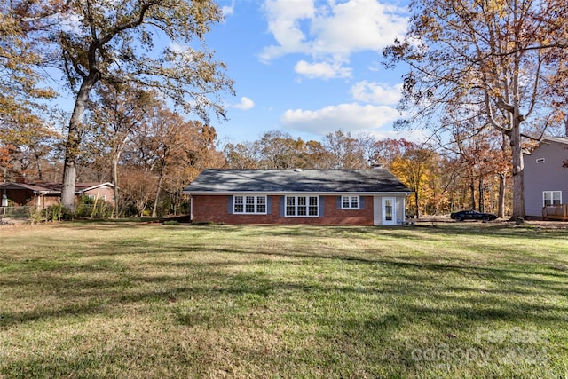 exterior space with a front lawn