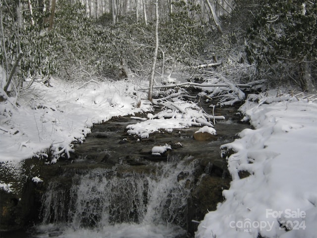 view of snow covered land