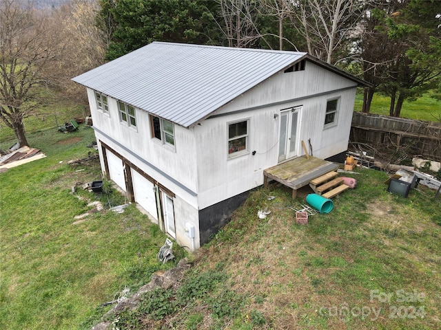 exterior space with a lawn and central air condition unit