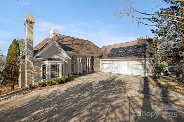 view of front of home with solar panels