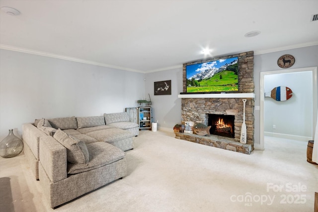 living room with ornamental molding, a fireplace, and carpet floors