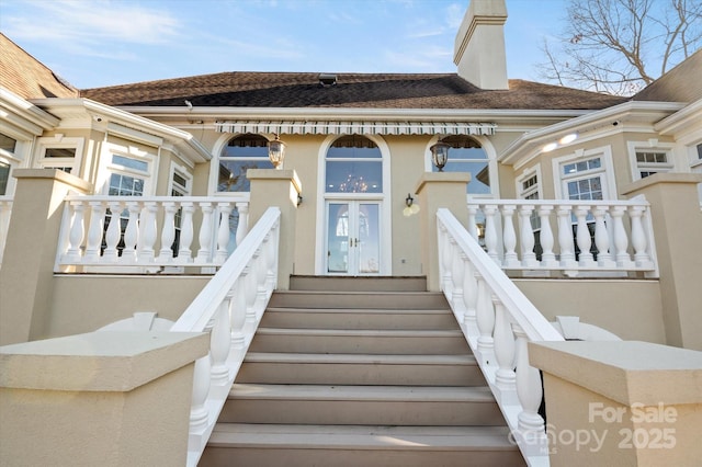 exterior space featuring a balcony