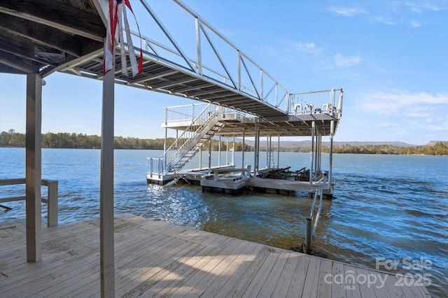 dock area with a water view