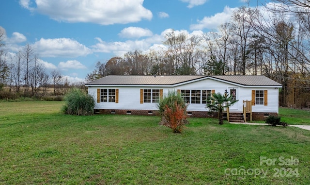 view of front of house with a front yard