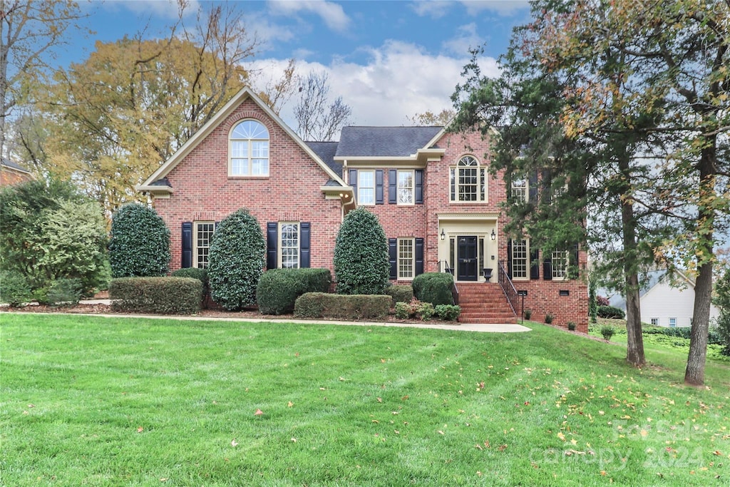 colonial house with a front lawn