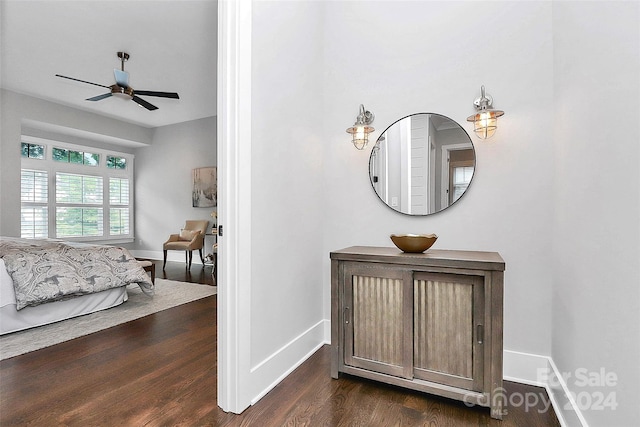 bedroom featuring ceiling fan and dark hardwood / wood-style floors