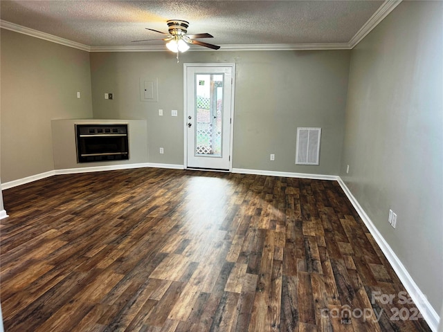 unfurnished living room featuring ceiling fan, dark hardwood / wood-style flooring, and a textured ceiling