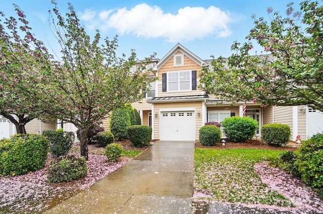view of front of home with an attached garage and driveway