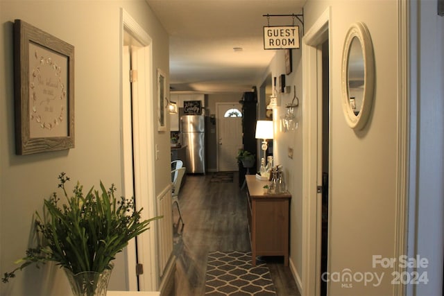 hallway featuring dark hardwood / wood-style flooring