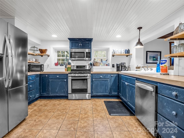 291 Tryon Bay Cir, Lake Lure, NC 28746 - kitchen featuring open shelves, appliances with stainless steel finishes, blue cabinets, recessed lighting, and wood ceiling