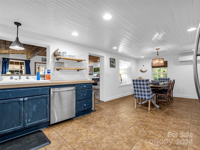 291 Tryon Bay Cir, Lake Lure, NC 28746 - kitchen featuring blue cabinets, stainless steel dishwasher, recessed lighting, light tile patterned floors, and an AC wall unit
