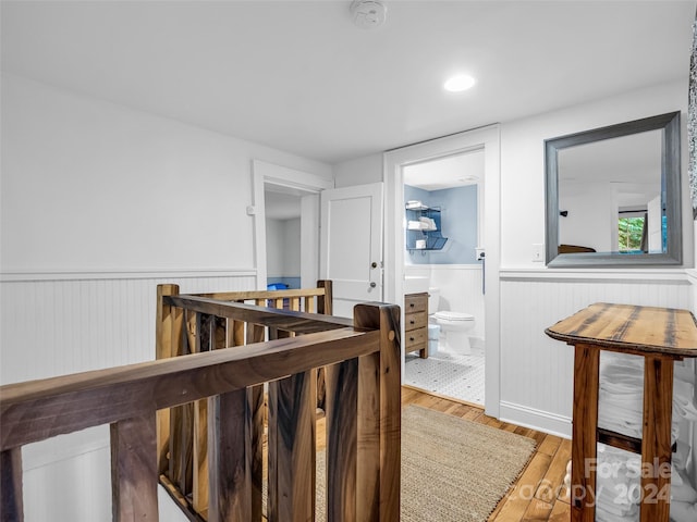 291 Tryon Bay Cir, Lake Lure, NC 28746 - corridor with wainscoting and wood finished floors