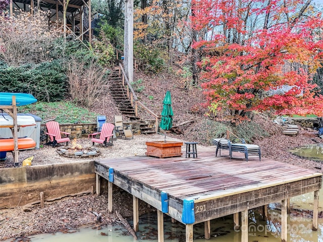291 Tryon Bay Cir, Lake Lure, NC 28746 - view of patio featuring a fire pit, stairway, and a wooden deck