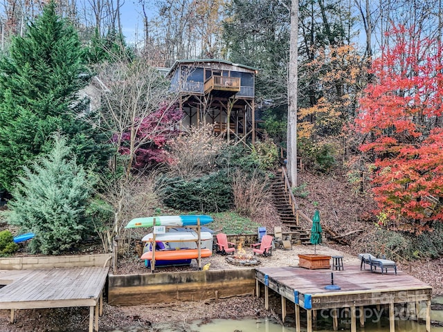 291 Tryon Bay Cir, Lake Lure, NC 28746 - view of yard with an outdoor fire pit, stairway, and a wooden deck