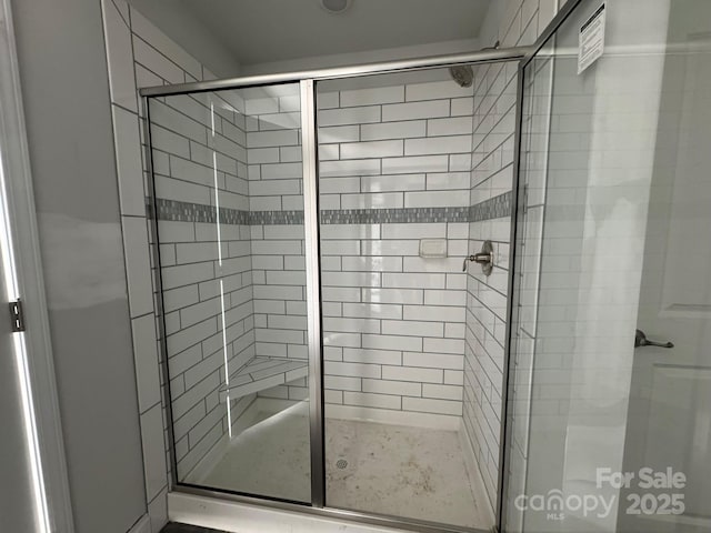 full bathroom featuring a stall shower