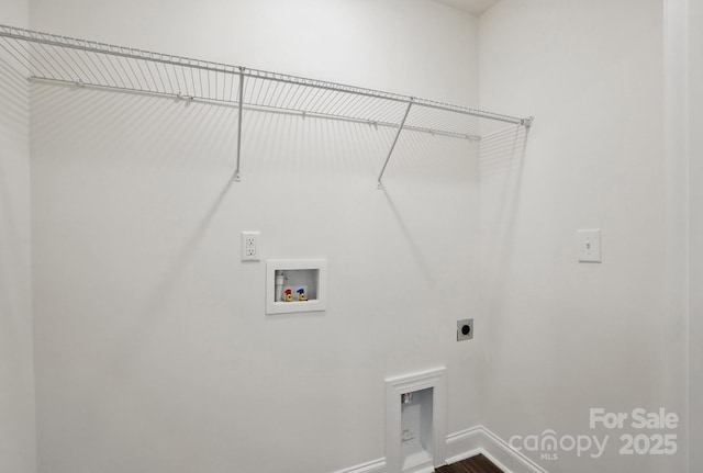 laundry room with laundry area, wood finished floors, hookup for an electric dryer, hookup for a washing machine, and baseboards