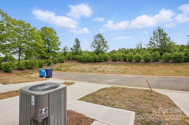 view of yard featuring central AC