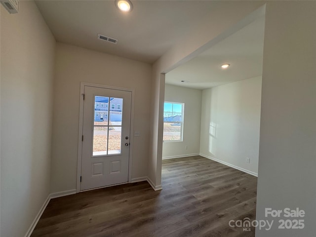 doorway featuring dark hardwood / wood-style flooring