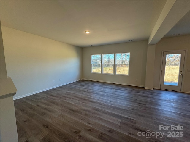 interior space with dark hardwood / wood-style floors