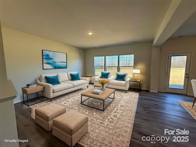 living room with dark hardwood / wood-style flooring