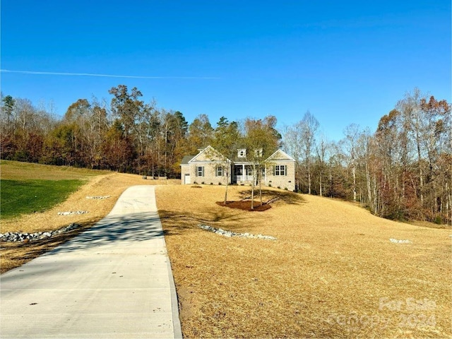 view of front of home with a front lawn