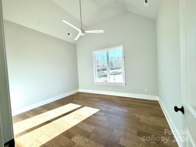 spare room with ceiling fan, high vaulted ceiling, and dark hardwood / wood-style floors